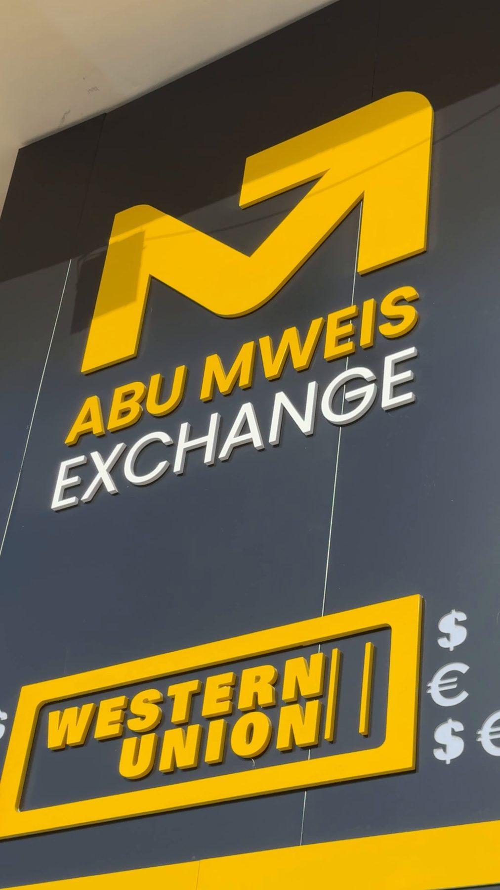 The logo and Western Union panel up close.