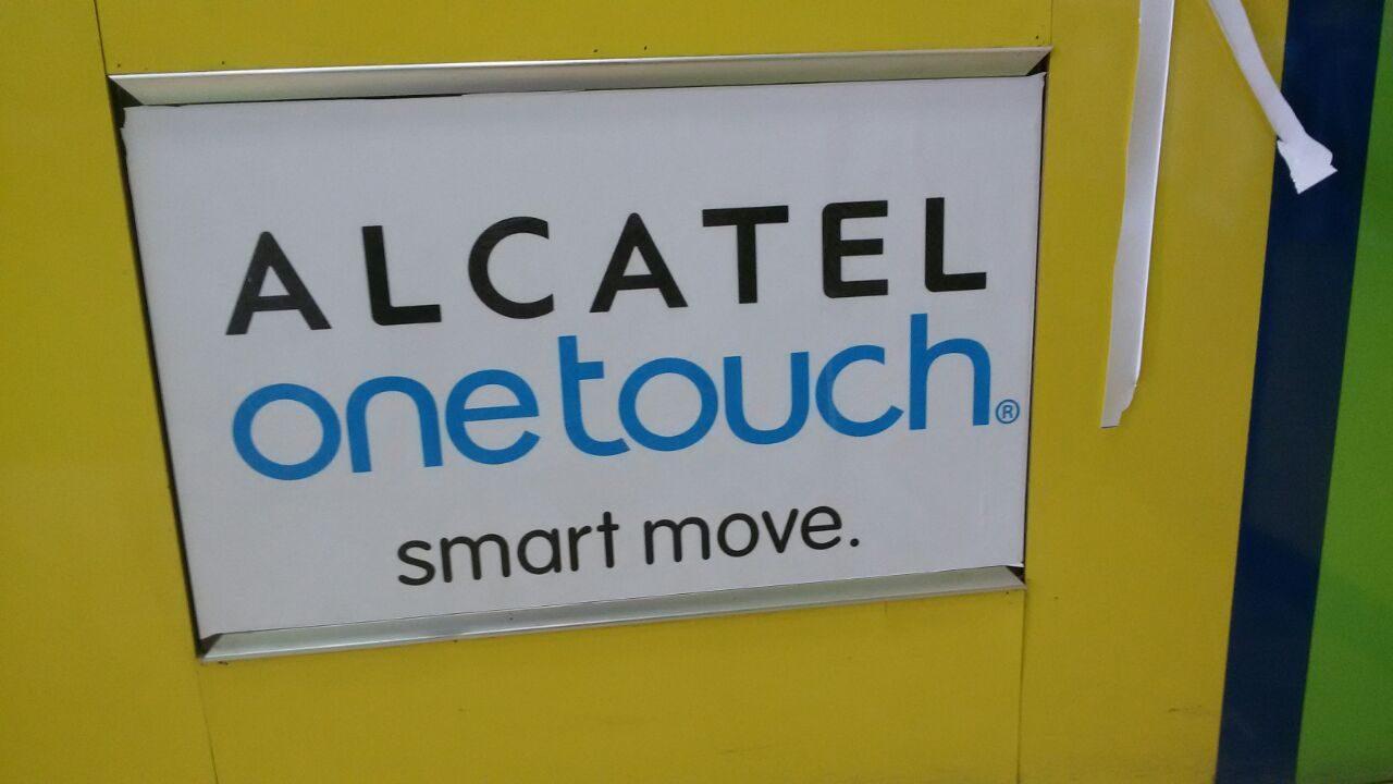 White panel on a yellow shop frame