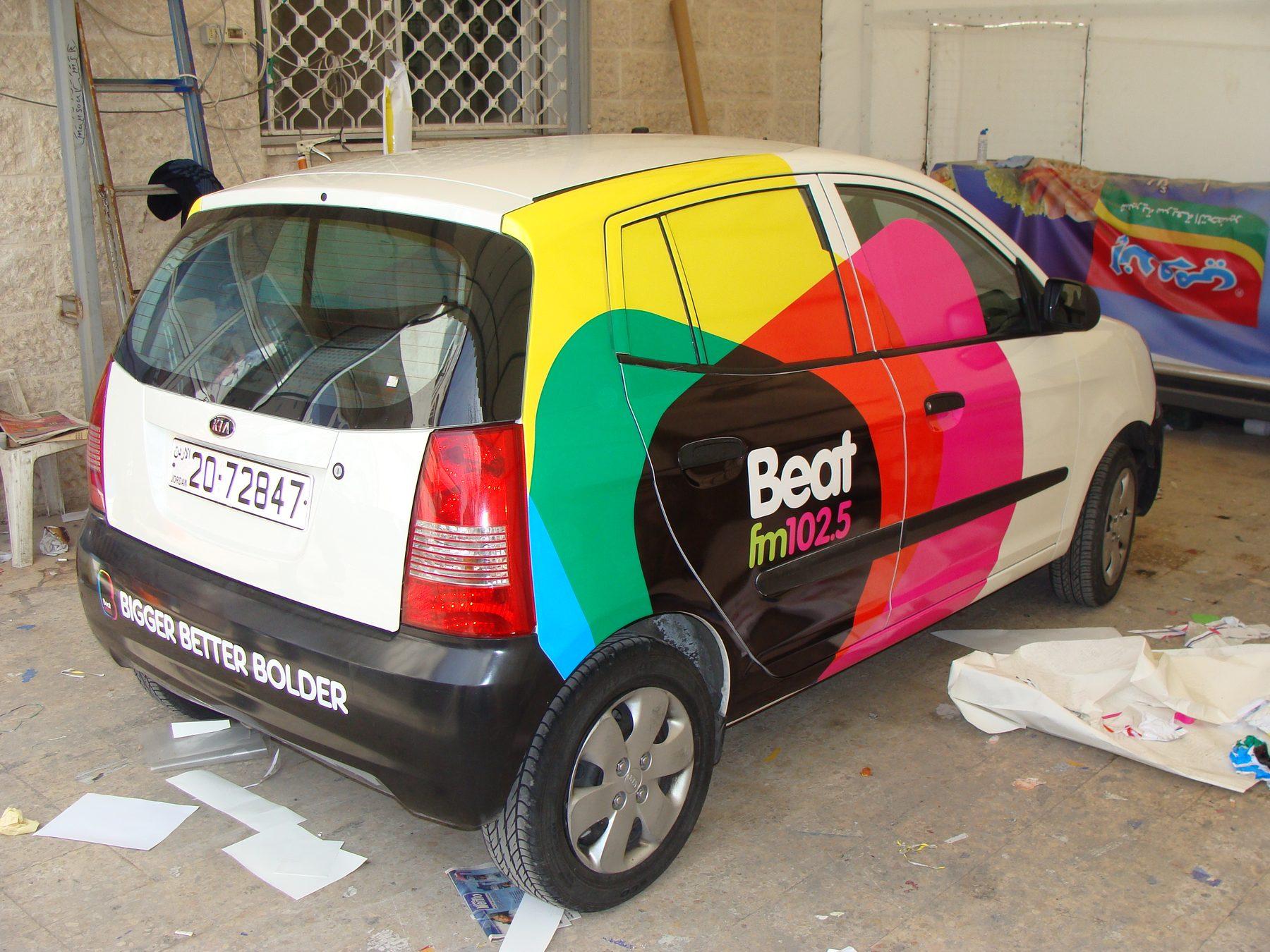 Side three-quarter view showing the colour-block graphic