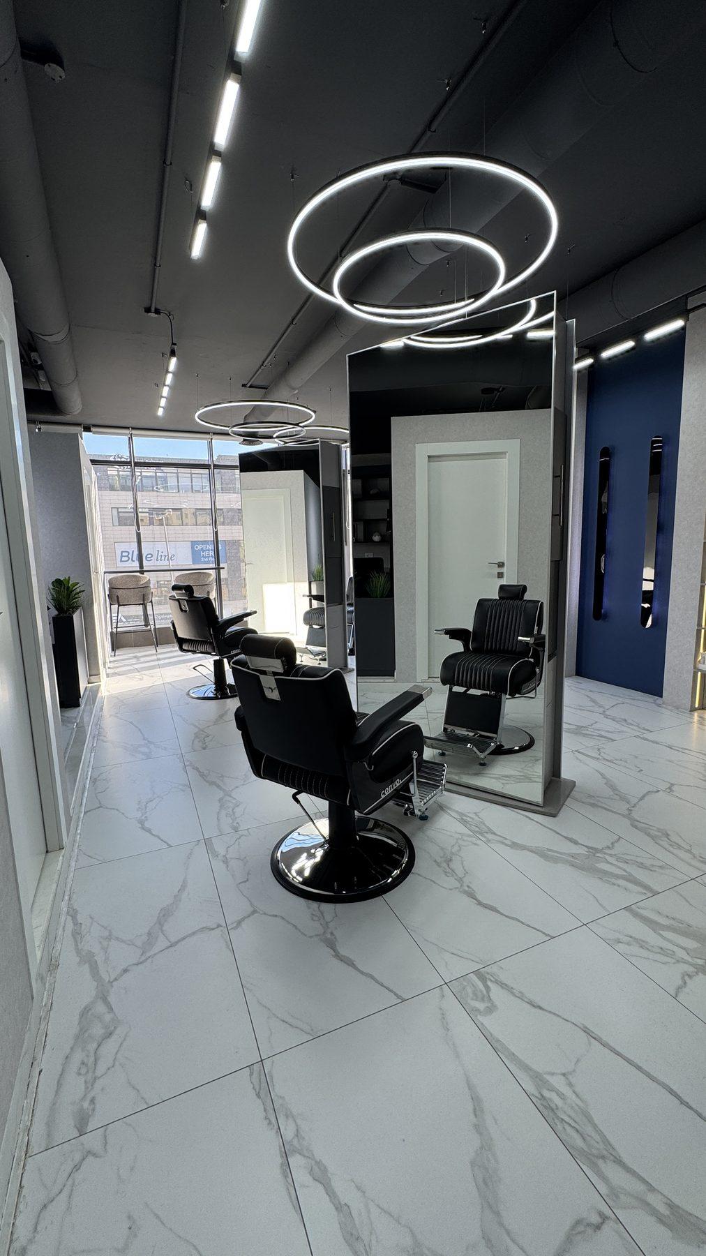 A barber station under ring lights.