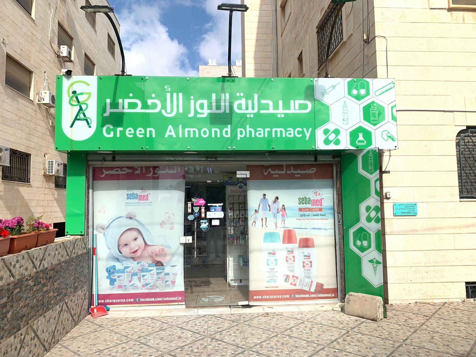 Daytime fascia sign above a pharmacy shopfront