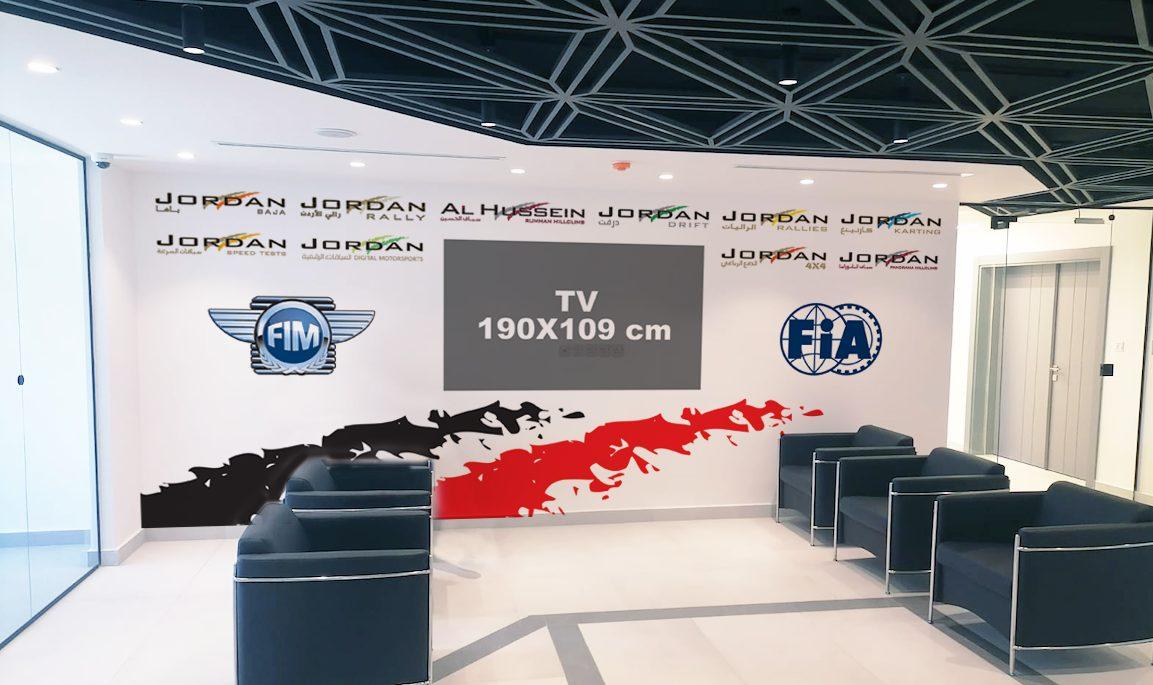 Reception wall graphic with motorsport and federation logos in red and black
