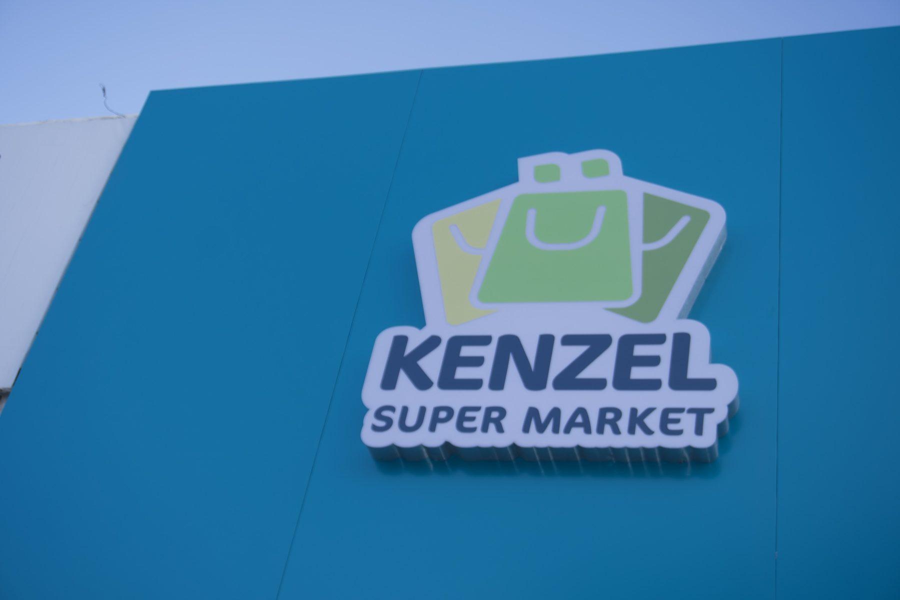 Frontal view of the dimensional logo on a blue fascia