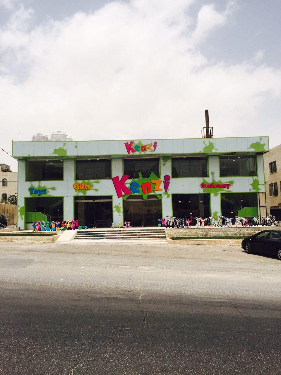 Multi-colour lettering across a building facade