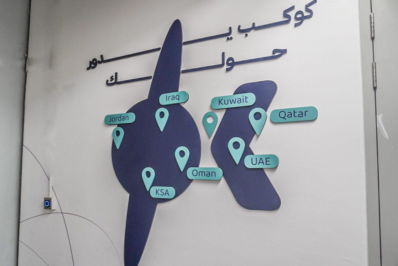 Dark-blue map-style panel with location pins for several countries