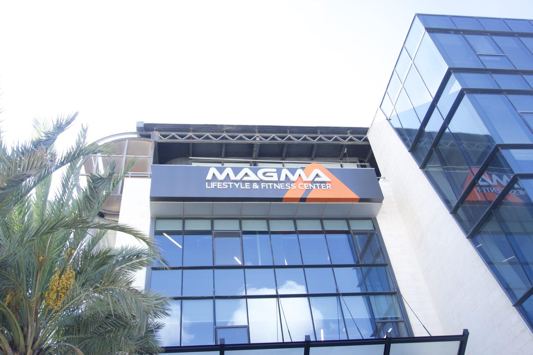 Fascia sign on a glass building front in daylight