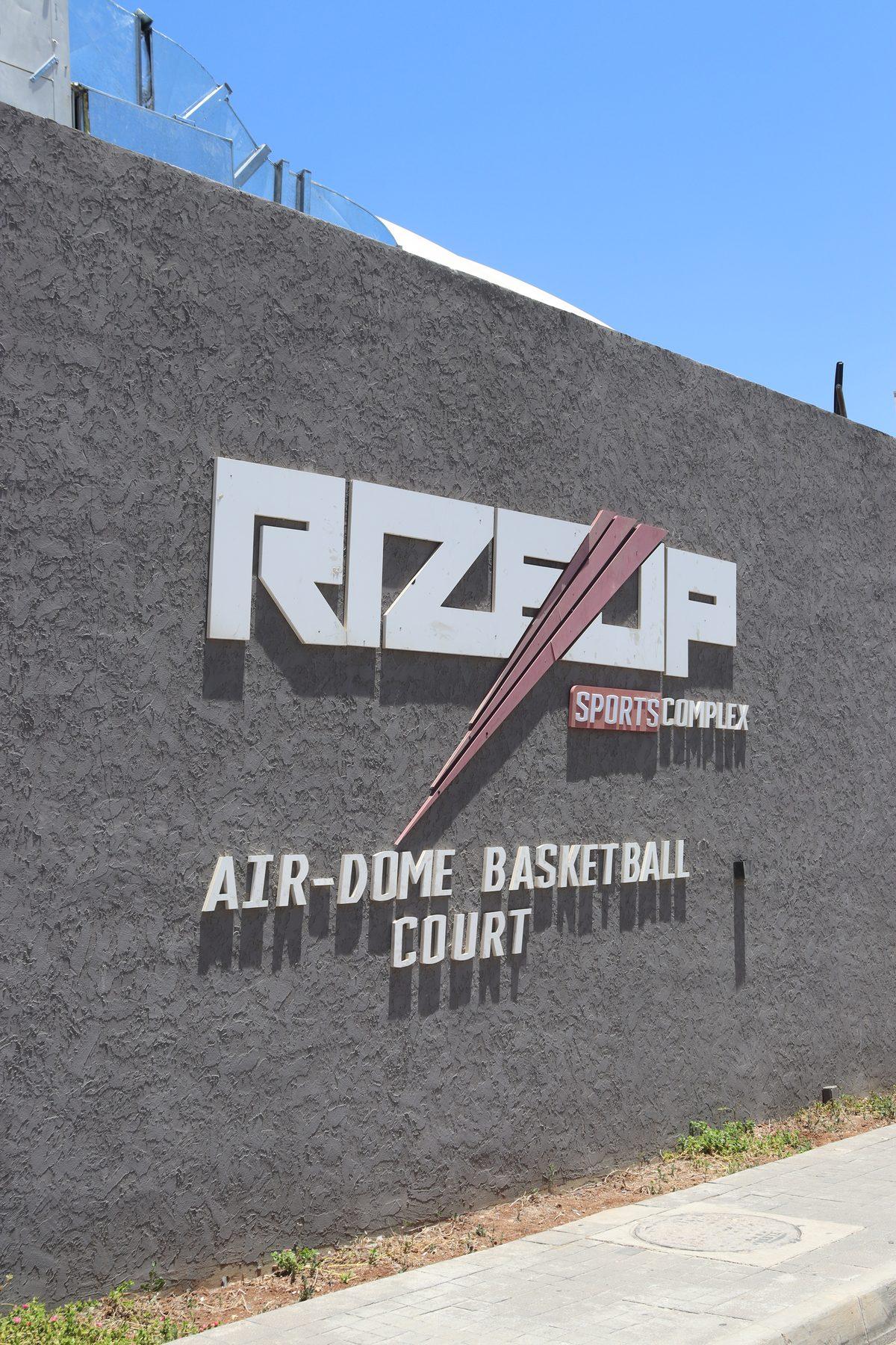 The wall sign in full sun.