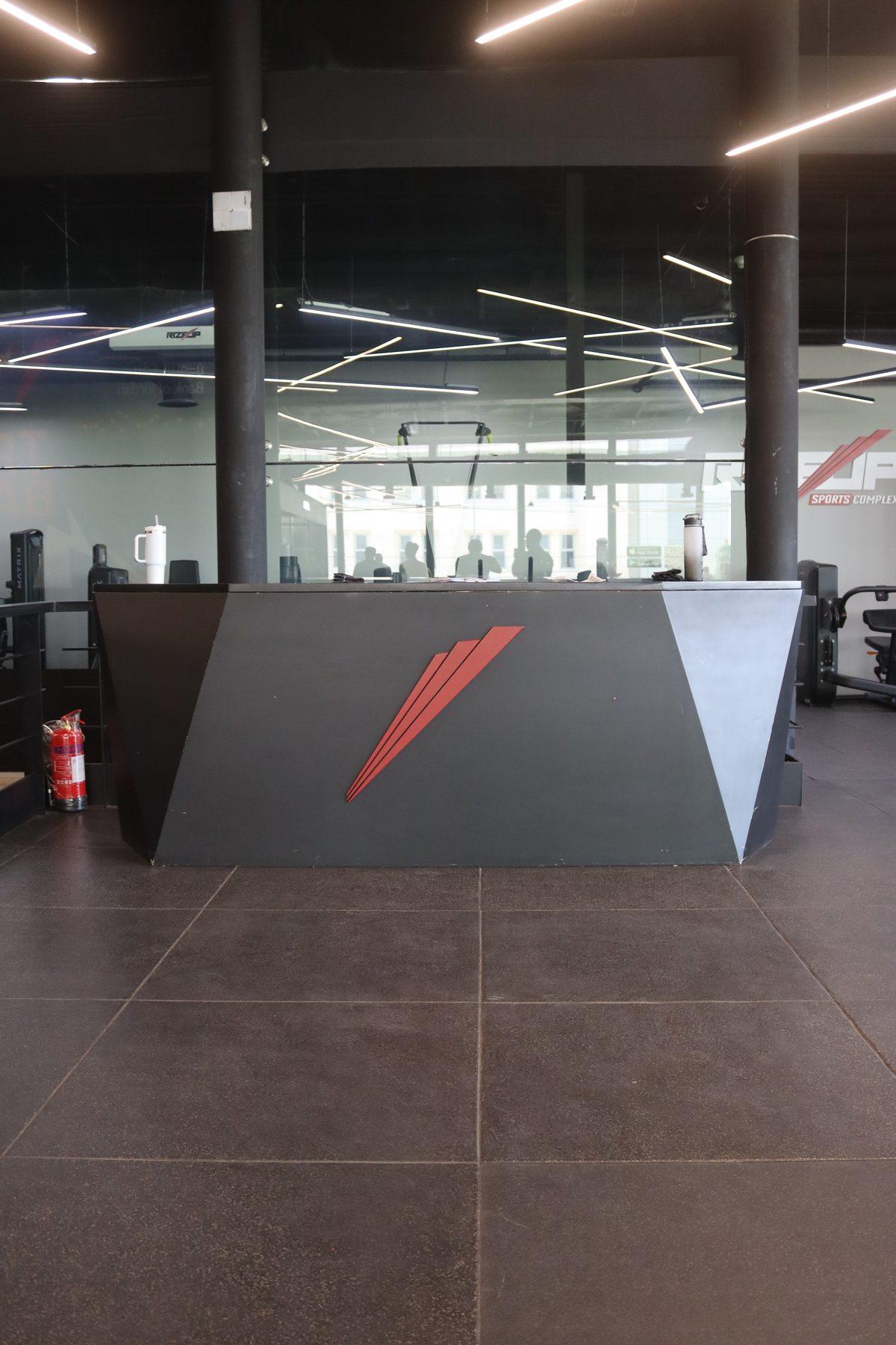The reception counter in the open gym hall.