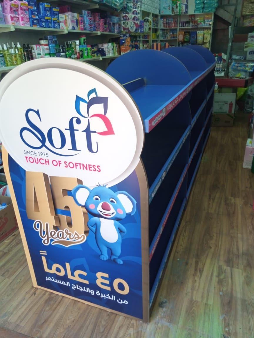 Curved blue display unit with a 45-years graphic on its front
