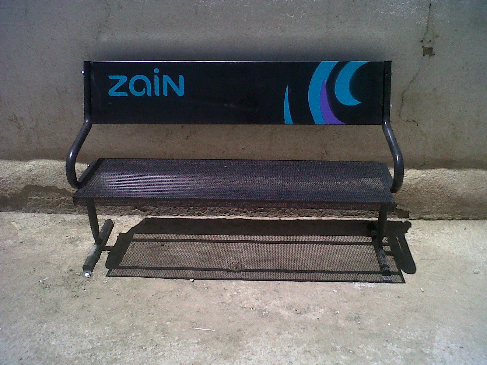 Metal bench with logo panel on the backrest