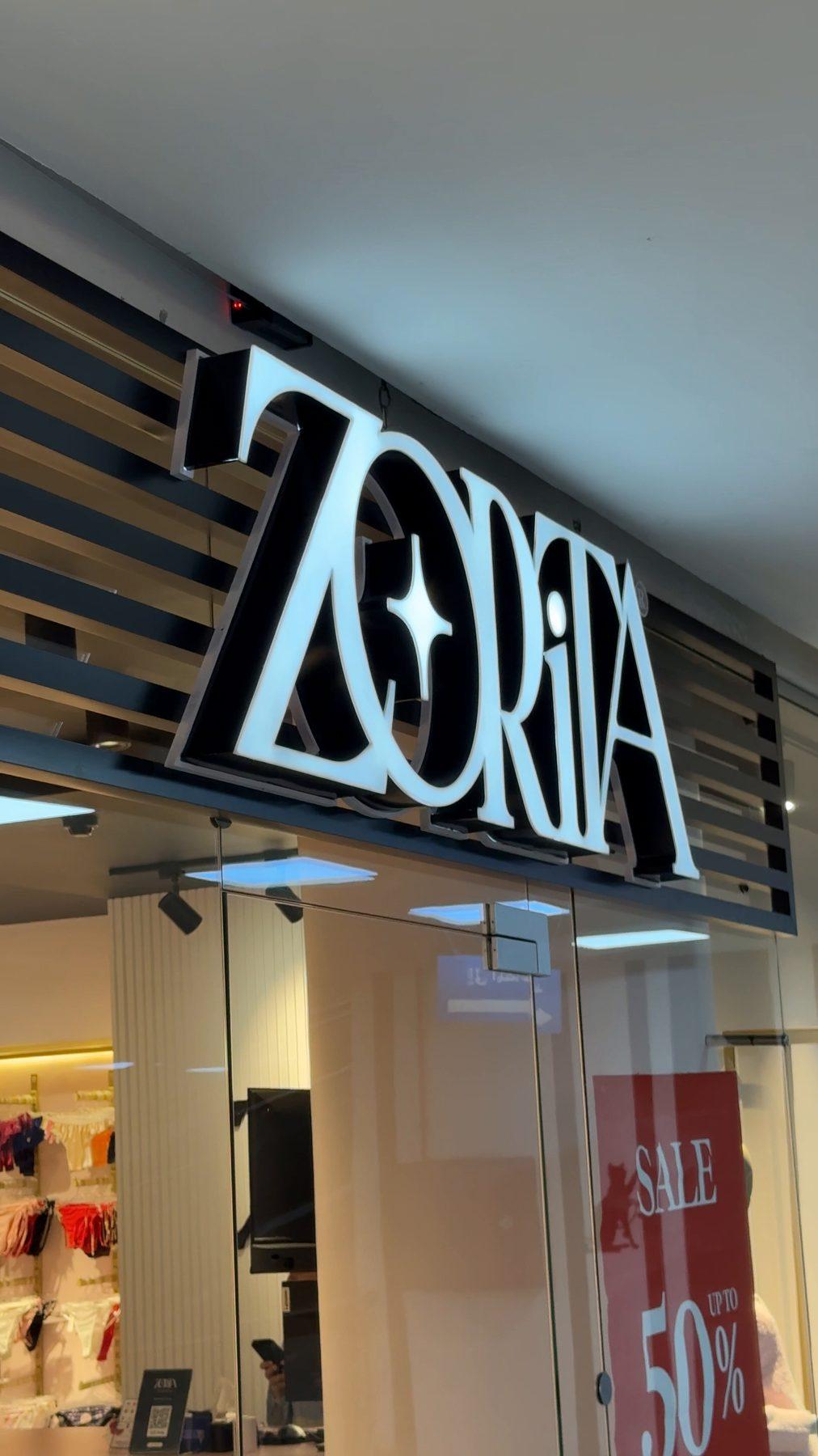 The illuminated logo from below.