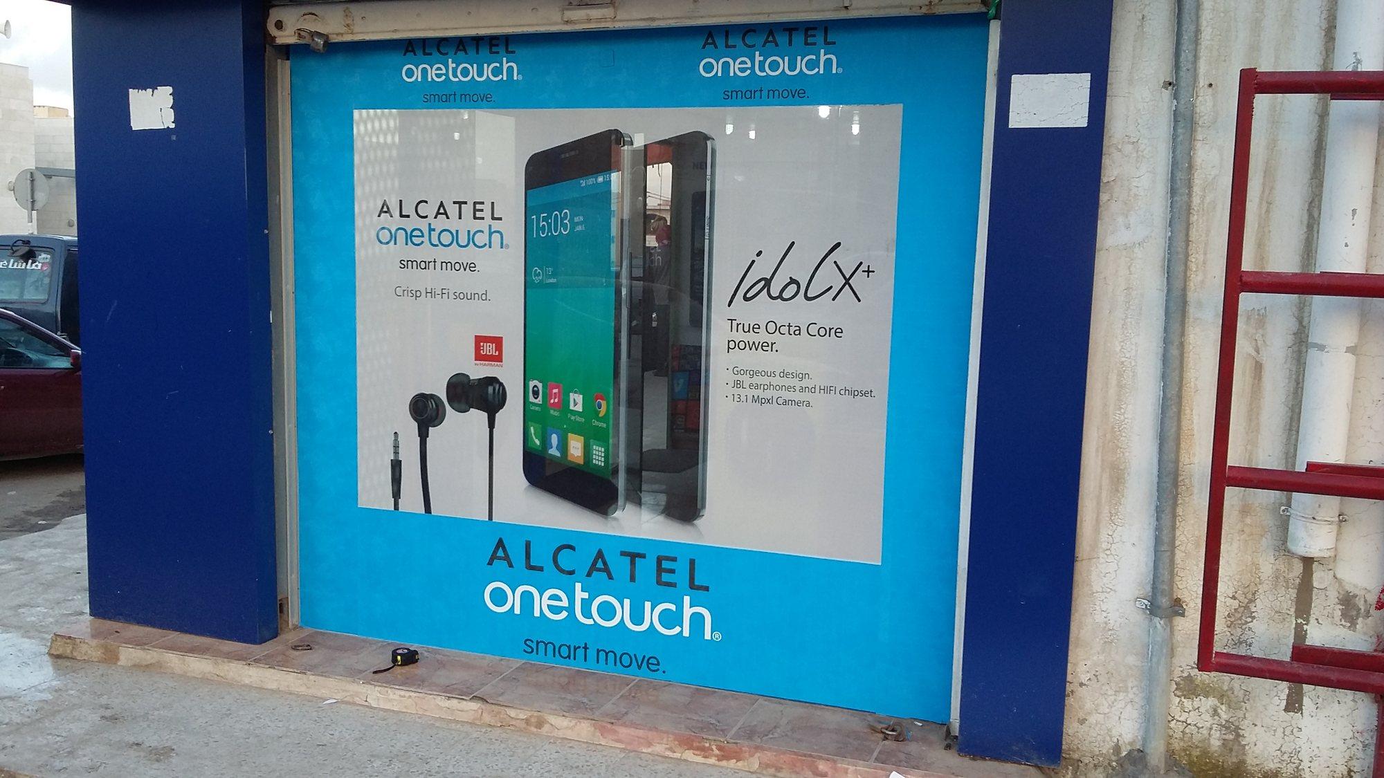 Printed window graphics on a mobile-phone shop